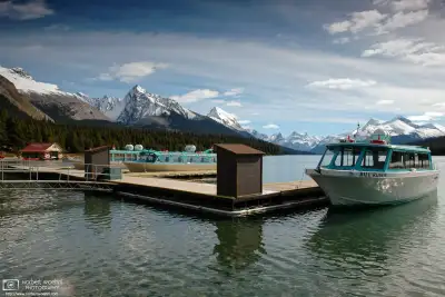 Spirit Island Tour Boats are on standby near Maligne Lake Boathouse in Jasper National Park, Alberta, Canada.