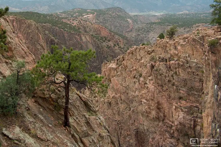 The Royal Gorge is a canyon on the Arkansas River near Cañon City, Colorado. It is a narrow, steep gorge through the granite of Fremont Peak.