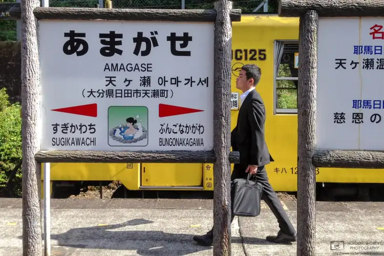 A daily-life moment from Amagase Station in Hita City, a small station along the Kyudai Main Line in Oita Prefecture on the western Japanese island of Kyushu.