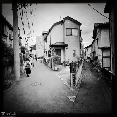 Monochrome photo of a quiet backstreet scene in the Itabashi Ward of Tokyo, Japan.
