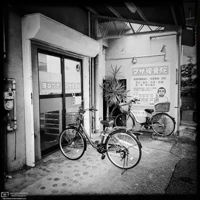 Monochrome photo of a quiet backstreet scene in the Itabashi Ward of Tokyo, Japan.