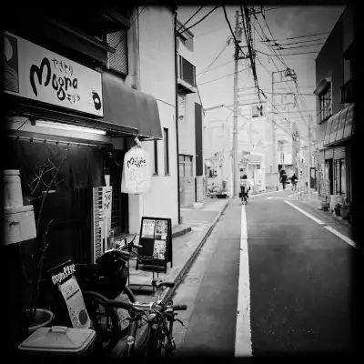 Scene outside a small Yakitori restaurant in the Hasunumacho area of Itabashi Ward in Tokyo, Japan.