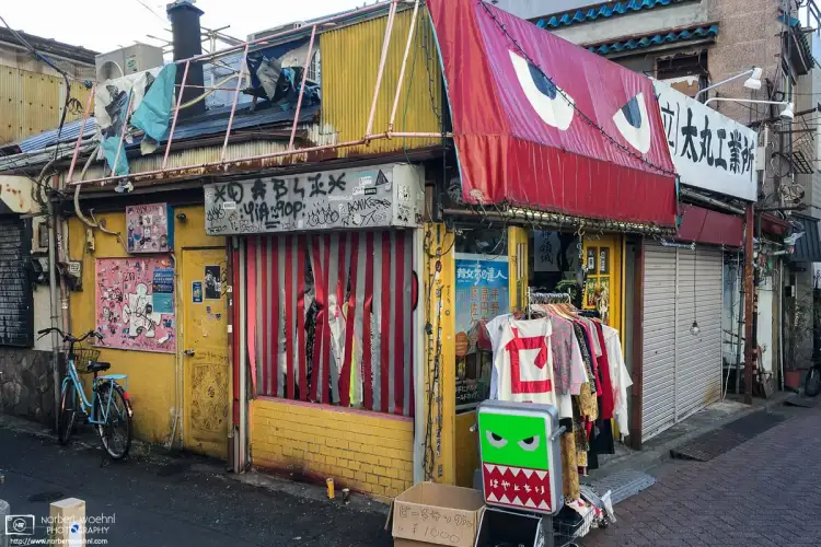 A second-hand clothing store is open for business at an incredibly run-down looking building in the Koenji area of Tokyo, Japan.