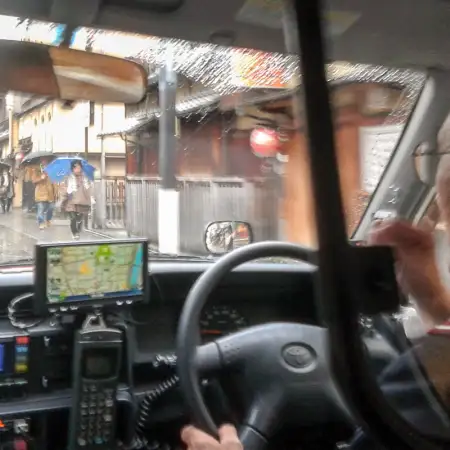 During heavy rain in Kyoto, Japan, this photo was taken on a taxi ride through the Gion district.