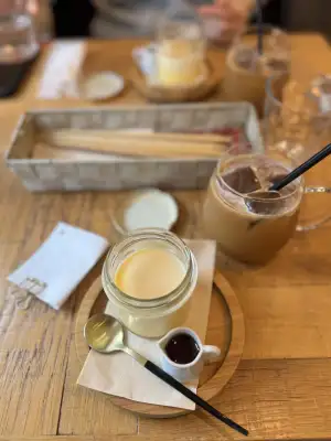 Pudding and iced coffee at Akabane Cafe にじいろのひつじ in Tokyo, Japan.