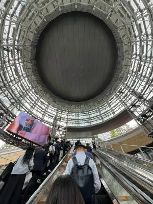 Riding up the big escalator from the subway station towards Mori Tower in Roppongi, Tokyo.