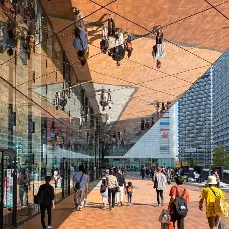 Window and ceiling reflections at Ariake Garden, a shopping, dining and entertainment complex in Tokyo Bay, Japan.