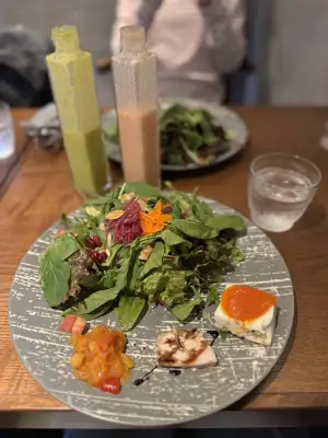 Italian Power Salad with two kinds of dressings at Casa del Sorriso, an Italian restaurant in the Nihonbashi area of Tokyo, Japan.