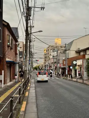 Late-afternoon sunlight hitting buildings in the Motohasunuma area of Itabashi Ward in Tokyo, Japan.
