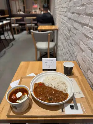 Lunch set of Ratatouille Curry and Borscht at "Soup Stock Tokyo" in Toyosu, Tokyo.
