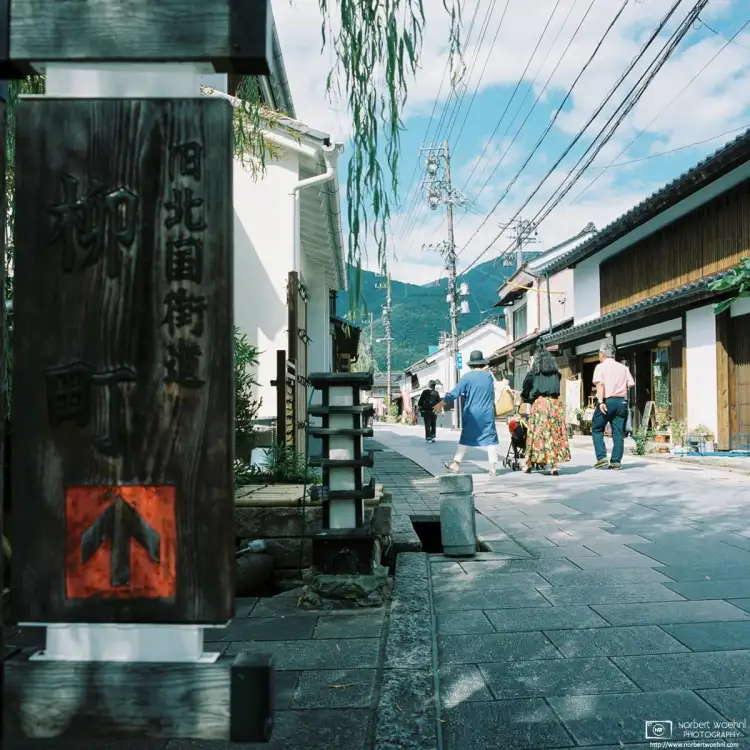 Historic Yanagimachi street in Ueda, Nagano Prefecture, Japan, is lined with traditional white-walled houses.