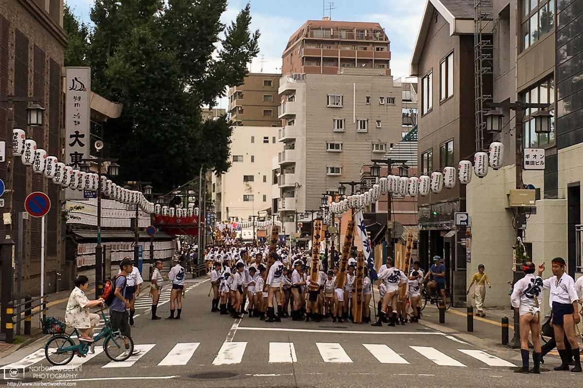Participants at the Hakata Gion Yamakasa Festival are assembling outside Kushida Shrine in Fukuoka, Japan.