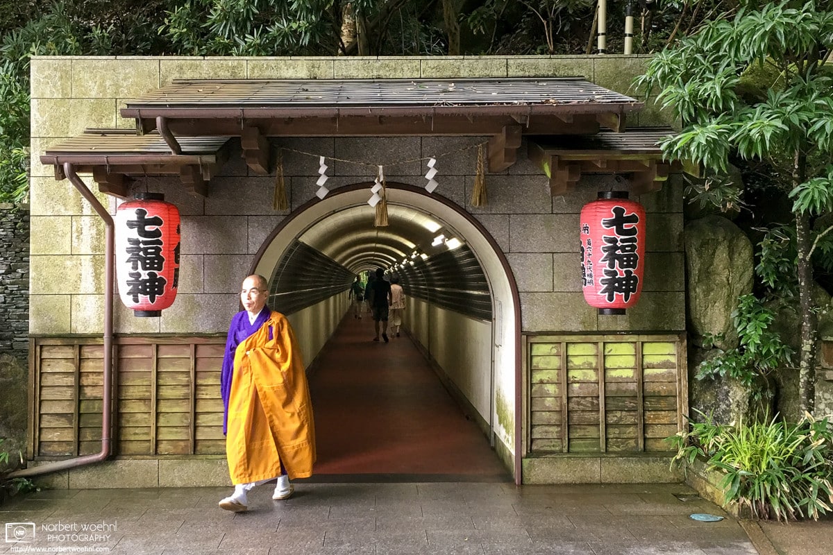 A priest is seen emerging from a pedestrian tunnel at Nanzoin Temple in Sasaguri, Fukuoka Prefecture, Japan.