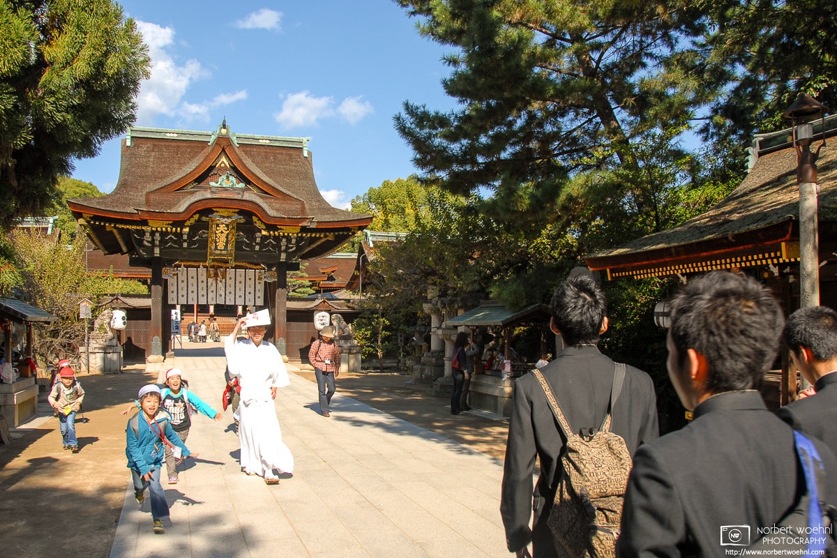 Students and Priest, Kitano Tenmangu Shrine, Kyoto, Japan Photo