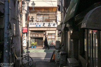 A view towards a Tonkatsu (pork cutlet) restaurant in the area around JR Itabashi Station in Tokyo, Japan.