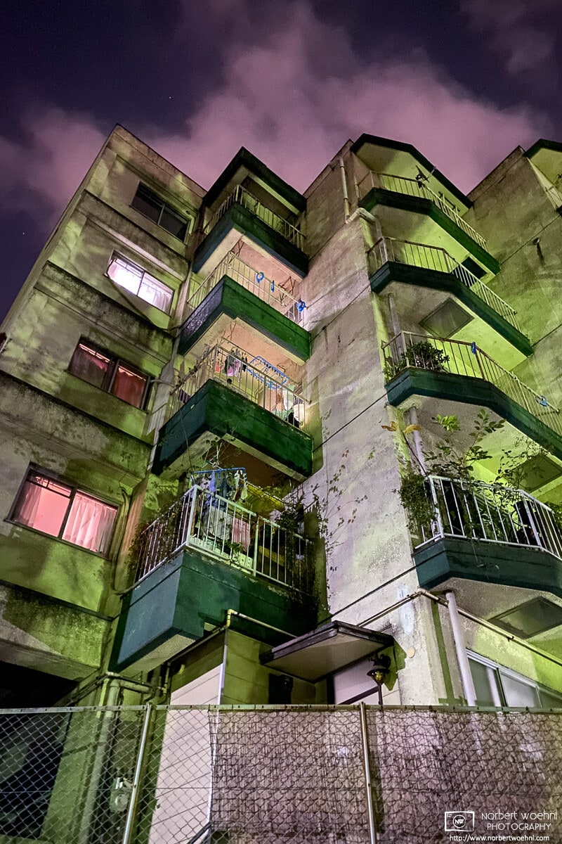 A nighttime view of an apartment building near Mitsugi Park in Itabashi-ku, Tokyo, Japan.