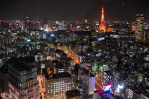 View towards an illuminated Tokyo Tower from a hotel room at the Park Hotel Shiodome in Tokyo, Japan.