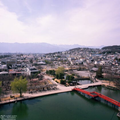 A splendid view through a small window at the top of Matsumoto Castle in Matsumoto, Nagano Prefecture, Japan.