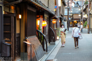 An early-evening encounter with a Maiko in the Gion district of Kyoto, Japan.