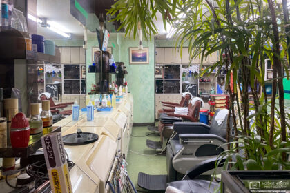 A retro-style interior as seen through the window of a barbershop in Otsuka, Tokyo, Japan.