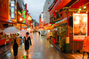 A colorful impression from a rainy evening around the Chinatown area of Kobe, Japan.