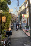 Look into a side street of the Yanaka district in the Taito ward of Tokyo, Japan.